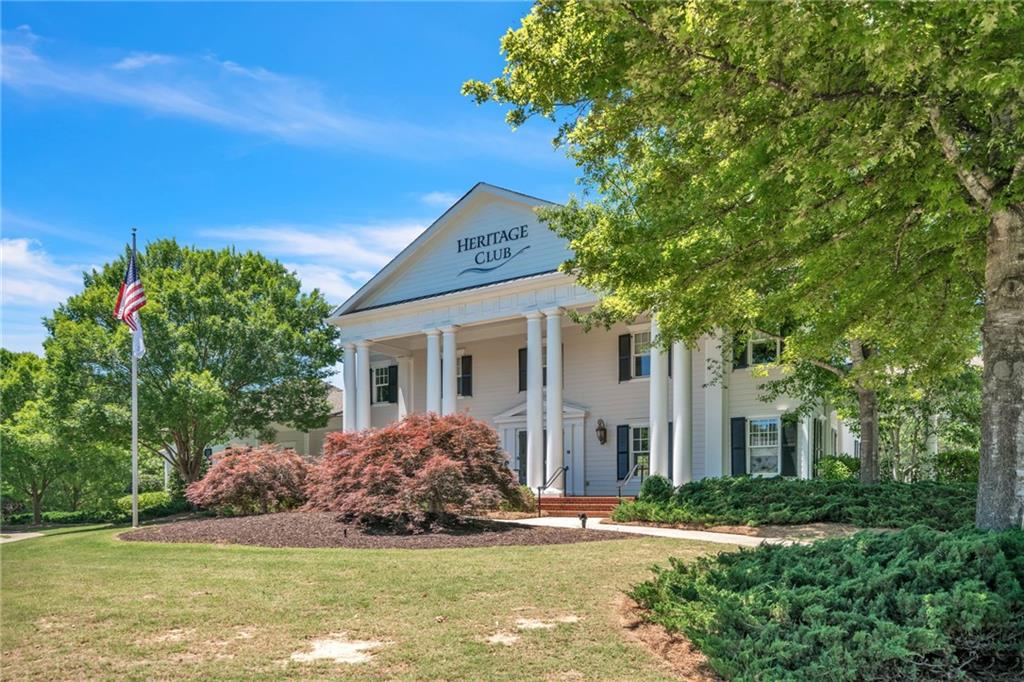 507 Blue Ridge Way Canton, GA 30114 - Photo 33 of 33 a front view of a house with a garden