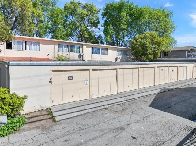 a view of a porch with a tree