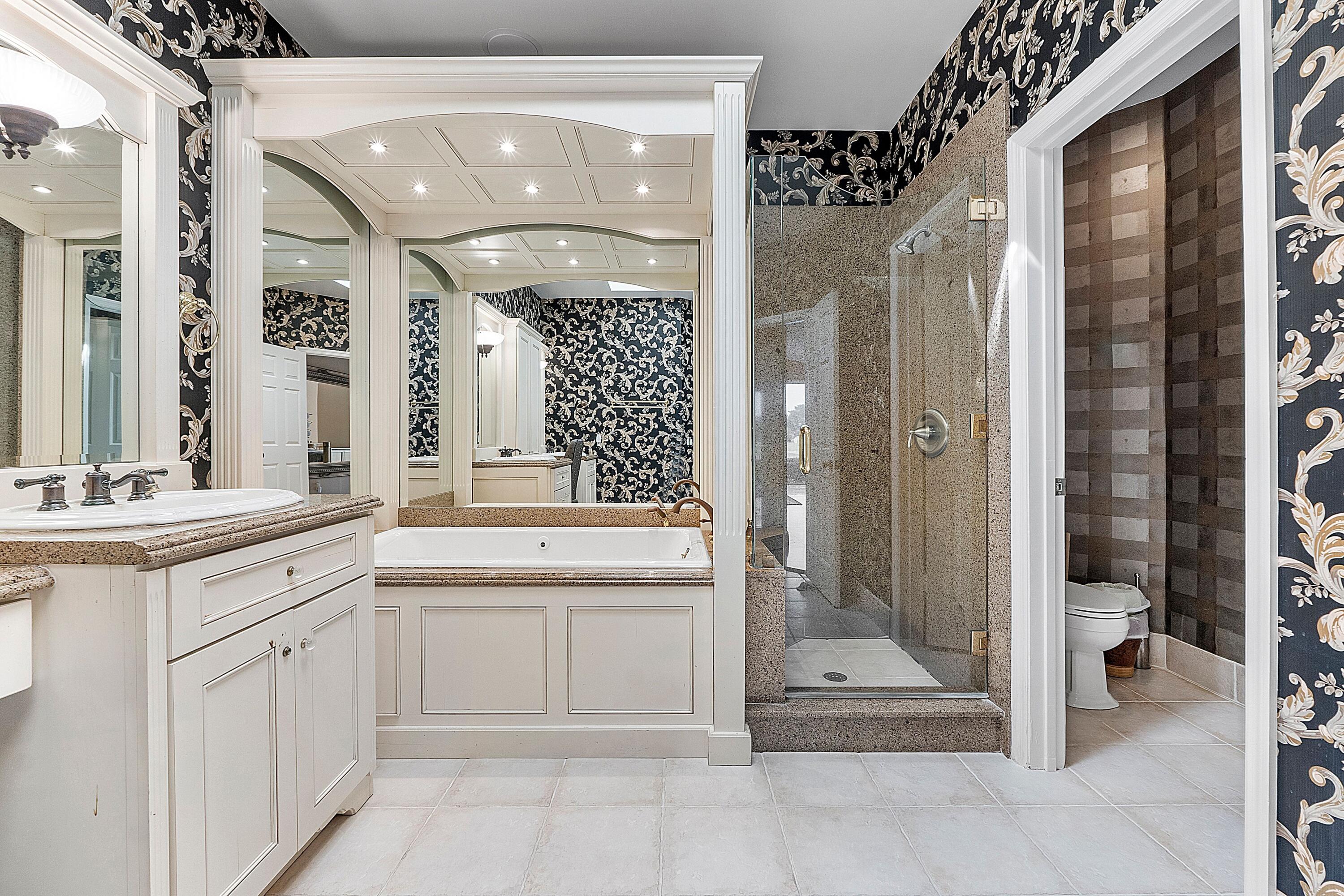 22570 Esplanada Drive Boca Raton, FL 33433 - Photo 22 of 47 first floor master batg