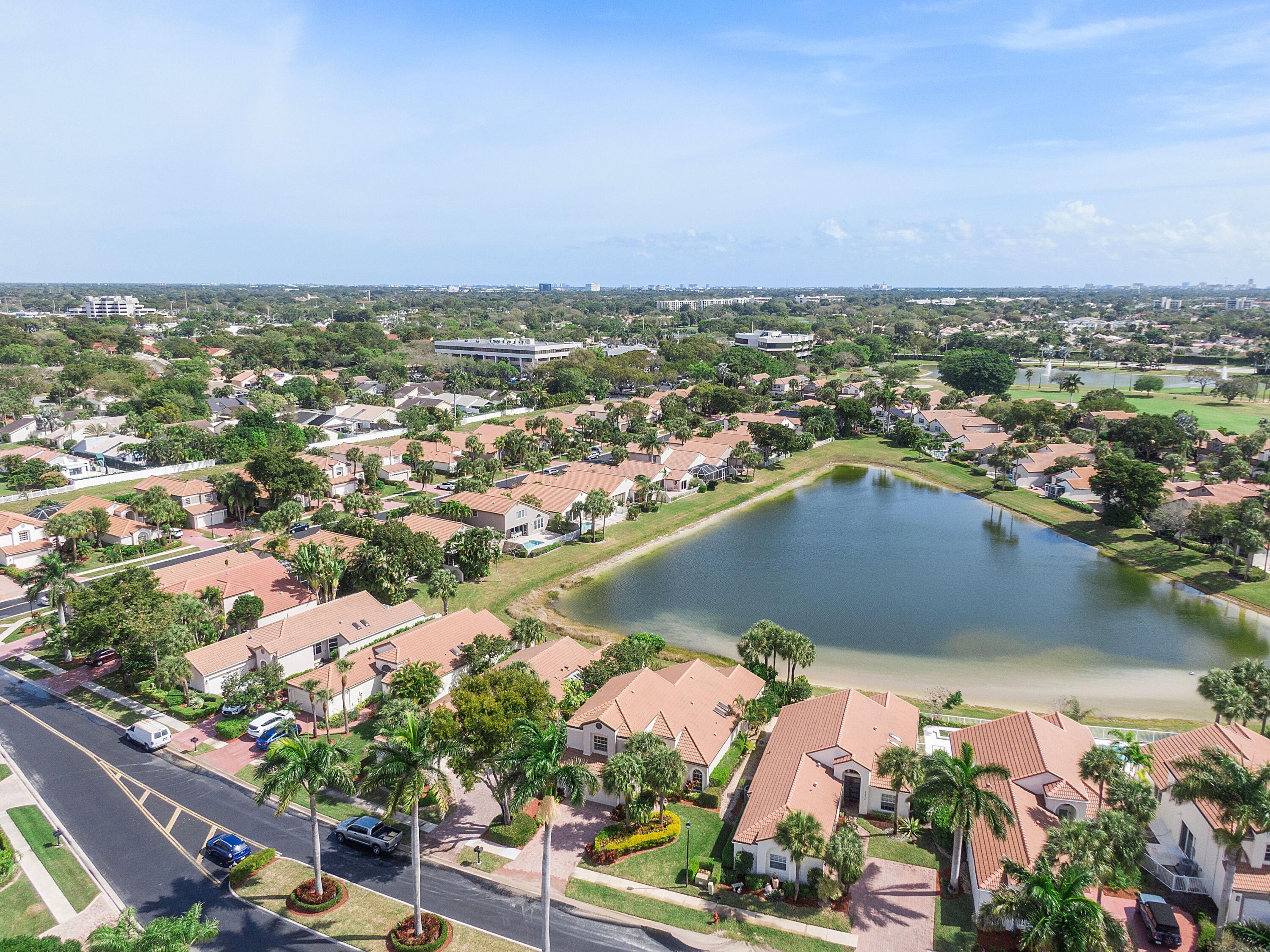 22570 Esplanada Drive Boca Raton, FL 33433 - Photo 38 of 47 ariel of lake and home