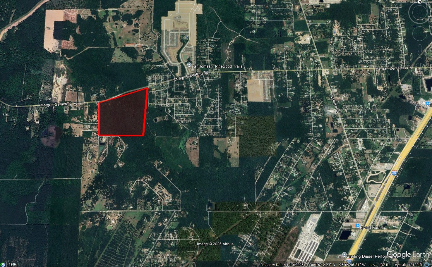 an aerial view of houses and roads