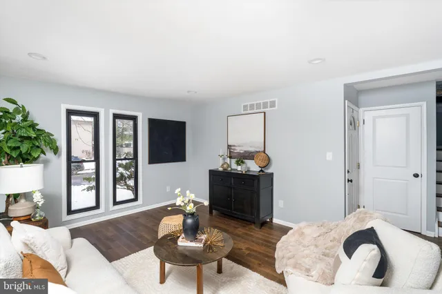 a living room with furniture and a couch