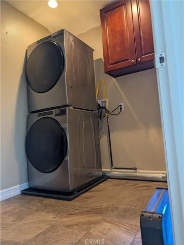 a close view of a utility room with washer and dryer