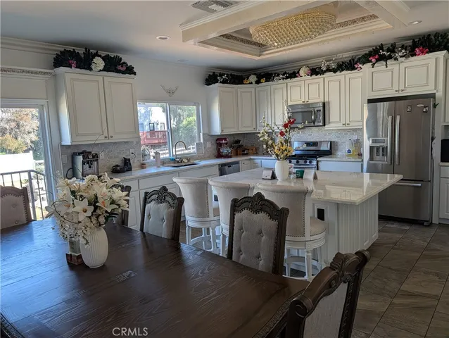 a kitchen with sink cabinets and window