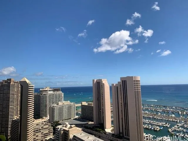 a view of a city with tall buildings