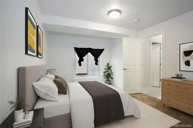a bathroom with a sink toilet and mirror