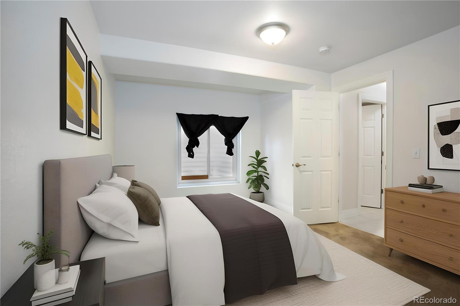 380 County Road Louisville, CO 80027 - Photo 16 of 27 a bedroom with a bed and a dresser