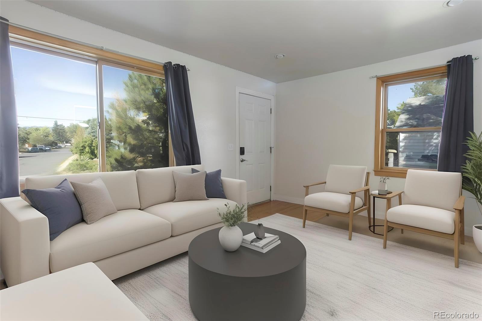 380 County Road Louisville, CO 80027 - Photo 4 of 27 a living room with furniture and a large window