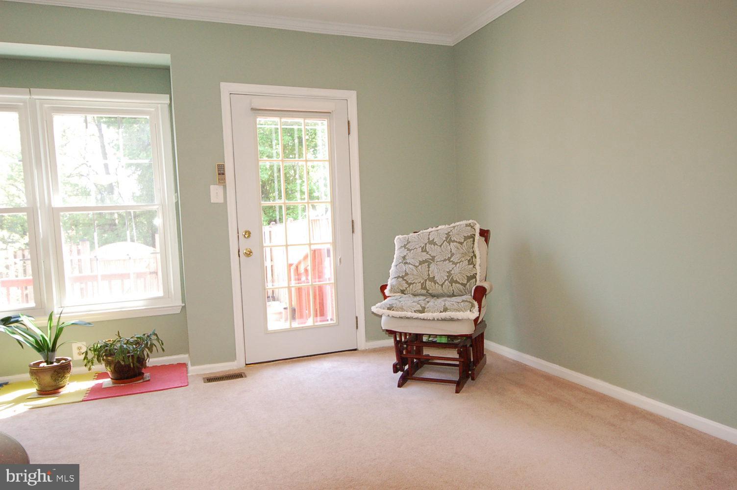 10820 Douglas Avenue Silver Spring, MD 20902 - Photo 17 of 61 Living room with access to fully fenced back yard