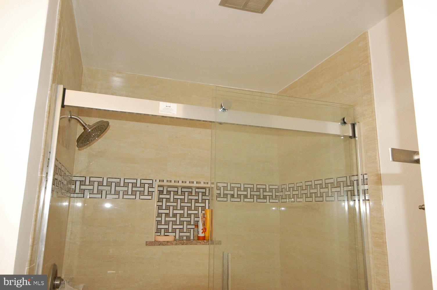 10820 Douglas Avenue Silver Spring, MD 20902 - Photo 27 of 61 Renovated primary bathroom