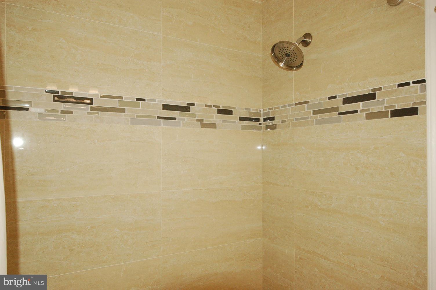 10820 Douglas Avenue Silver Spring, MD 20902 - Photo 33 of 61 Hallway bathroom tub shower tile to ceiling
