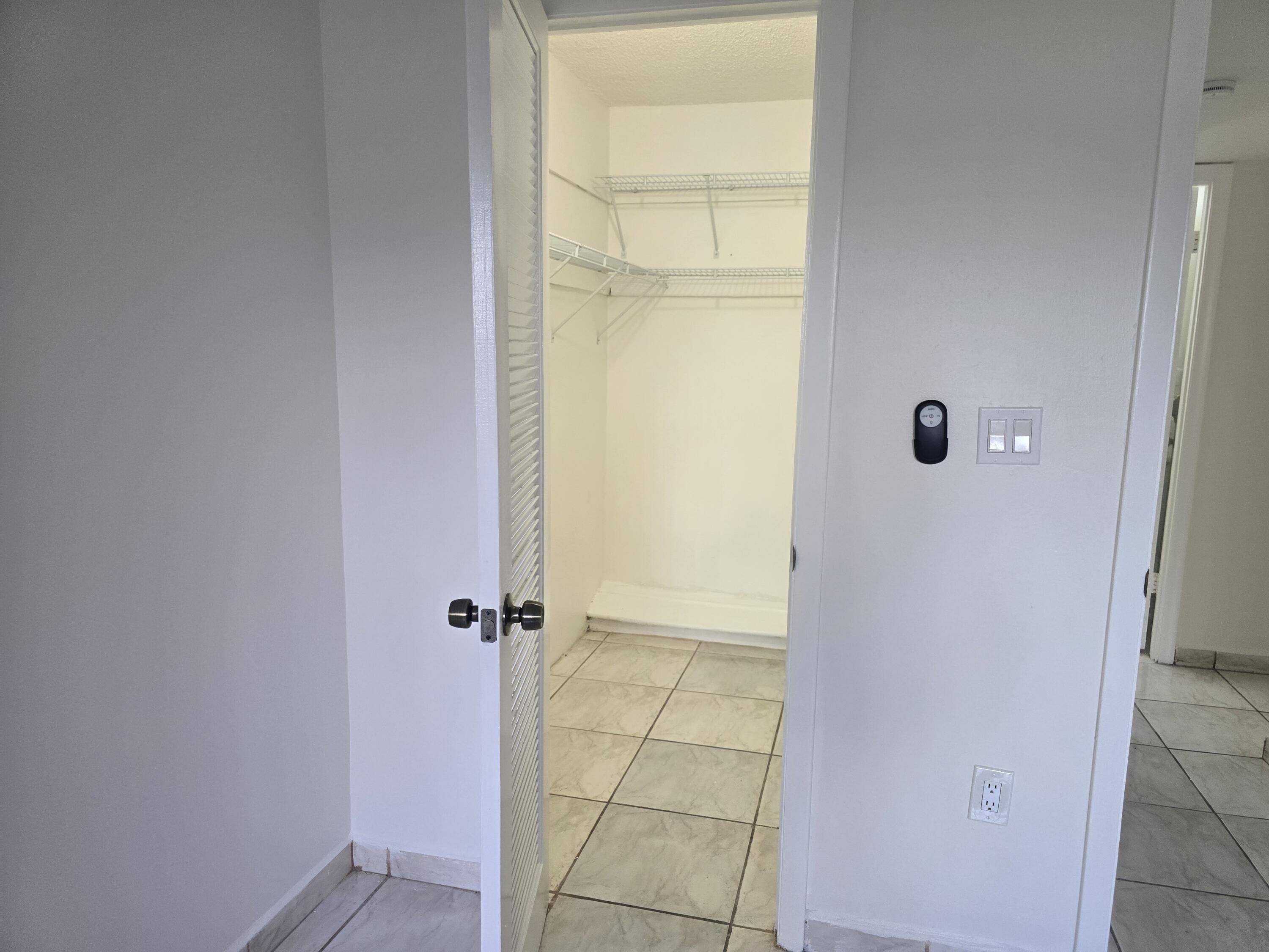 2741 North Pine Island Road, Unit 106 Sunrise, FL 33322 - Photo 13 of 14 a bathroom with a window