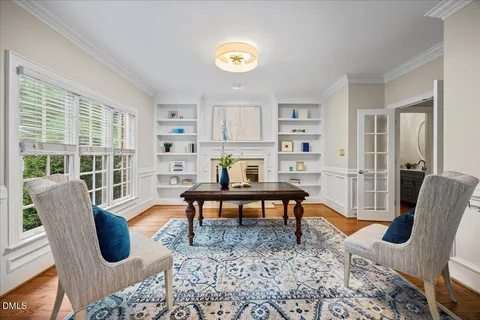 a spacious bedroom with a bed and a couch