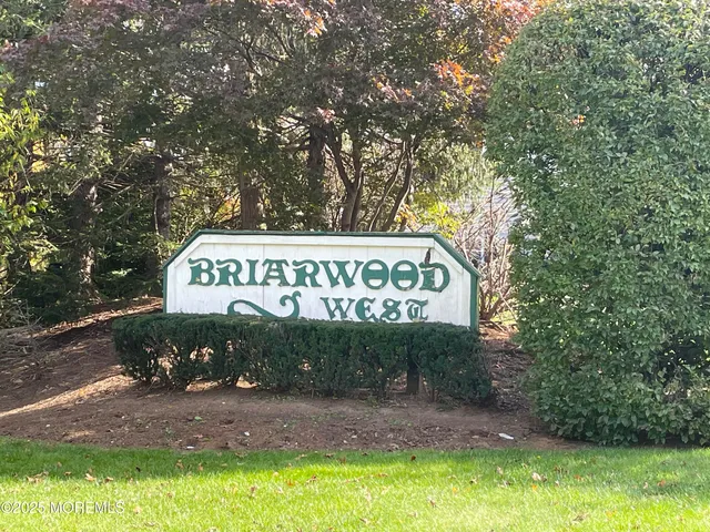 a sign broad on the side of a road