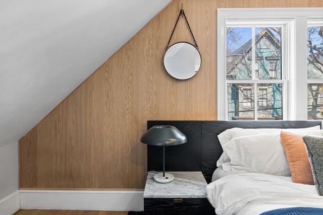 a living room with a couch and a large window