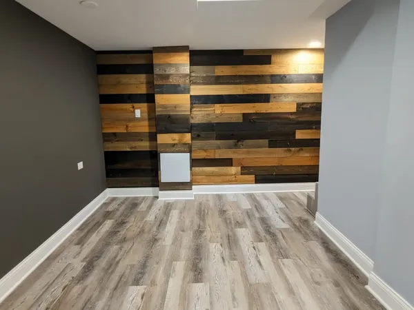 a view of room and wooden floor