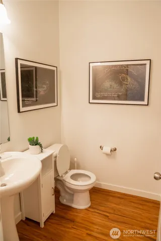 a bathroom with a toilet and a sink