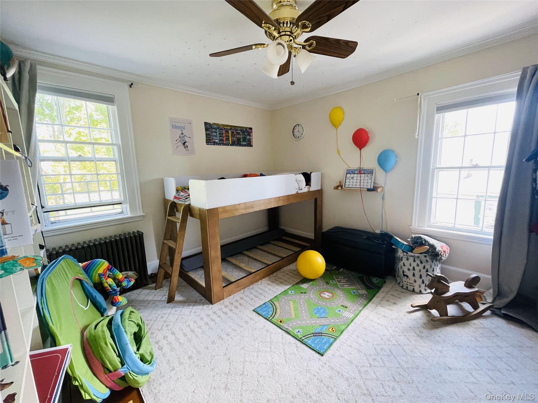 12 Parrott Street Cold Spring, NY 10516 - Photo 13 of 18 Bedroom with crown molding, and ceiling fan