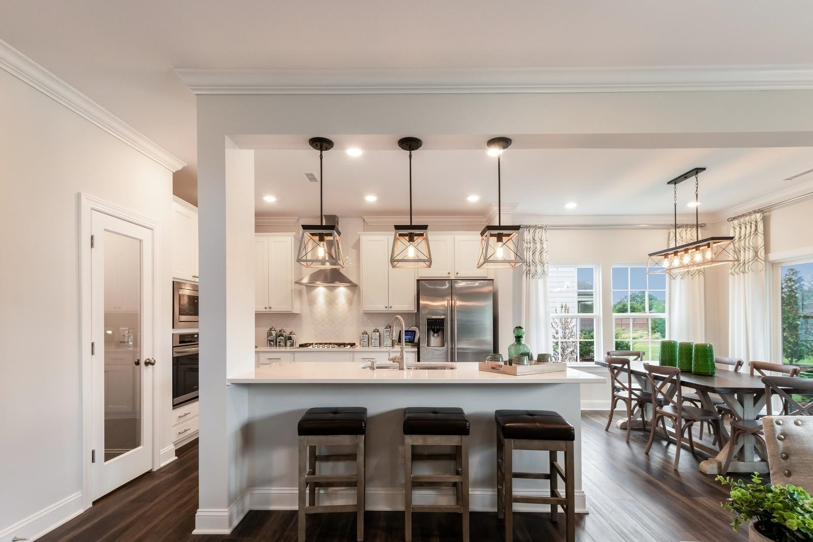 4121 Snowy Range Circle, Unit LANDRUM Raleigh, NC 27616 - Photo 11 of 27 a dining table with chairs and window