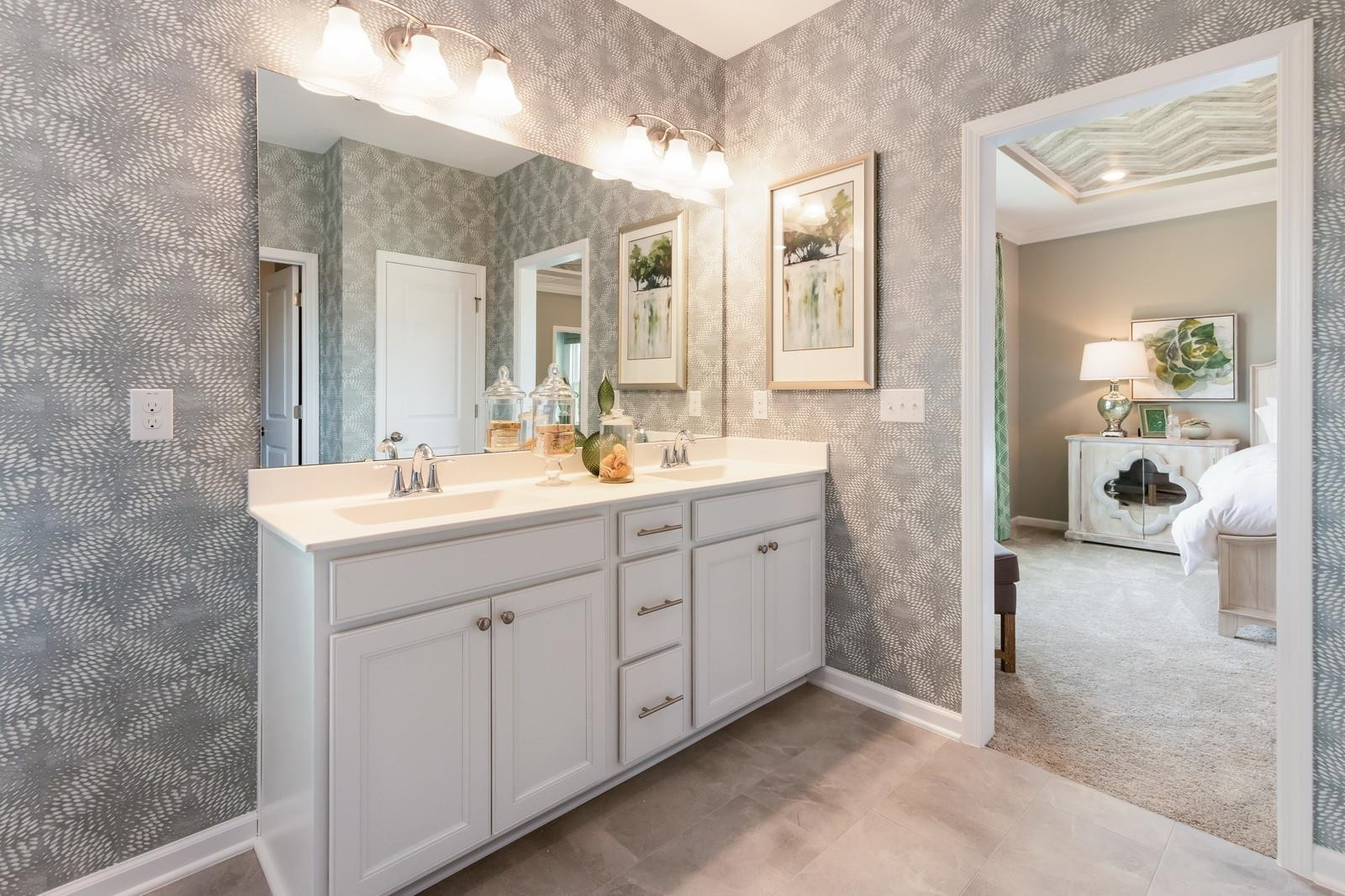 4121 Snowy Range Circle, Unit LANDRUM Raleigh, NC 27616 - Photo 17 of 27 a spacious bathroom with double sink and a mirror