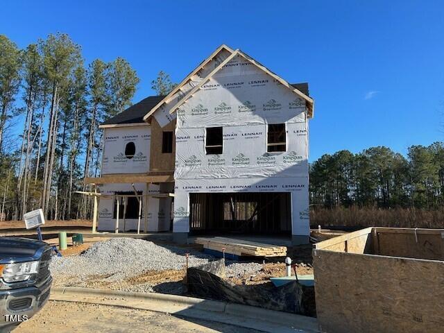 4121 Snowy Range Circle, Unit LANDRUM Raleigh, NC 27616 - Photo 2 of 27 a view of a house with couches chairs and a fireplace