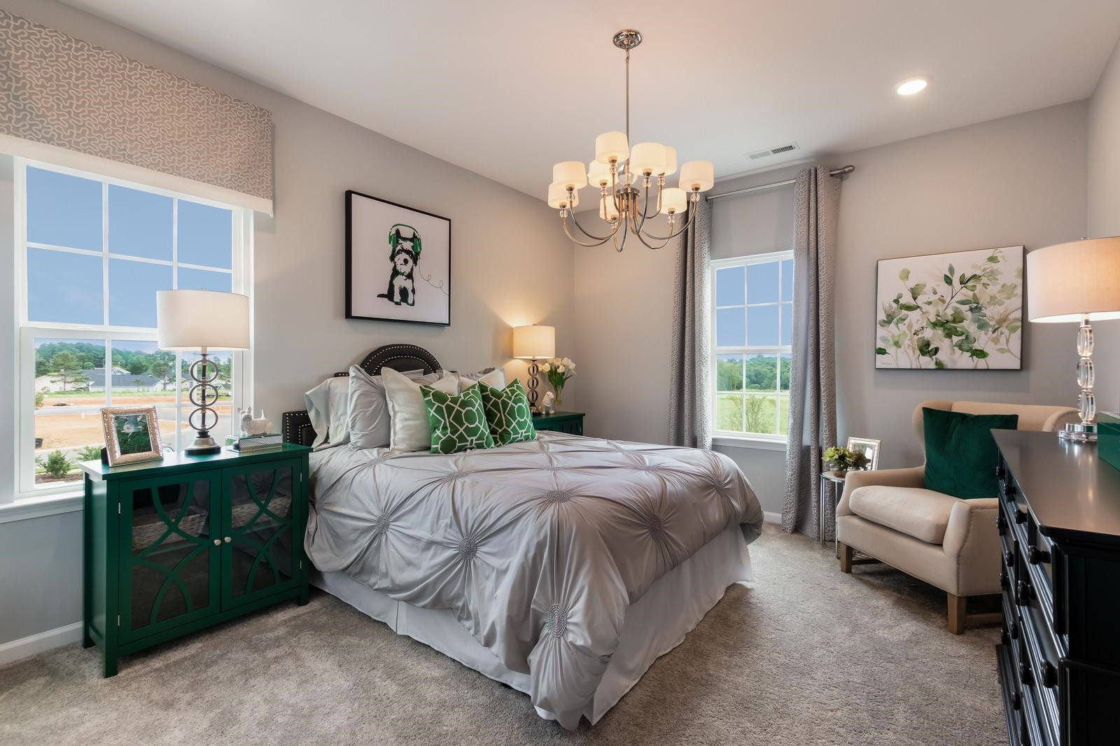 4121 Snowy Range Circle, Unit LANDRUM Raleigh, NC 27616 - Photo 22 of 27 a bedroom with a bed chandelier and a window