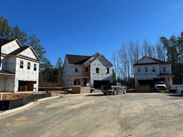 4121 Snowy Range Circle, Unit LANDRUM Raleigh, NC 27616 - Photo 3 of 27 a view of the street with houses