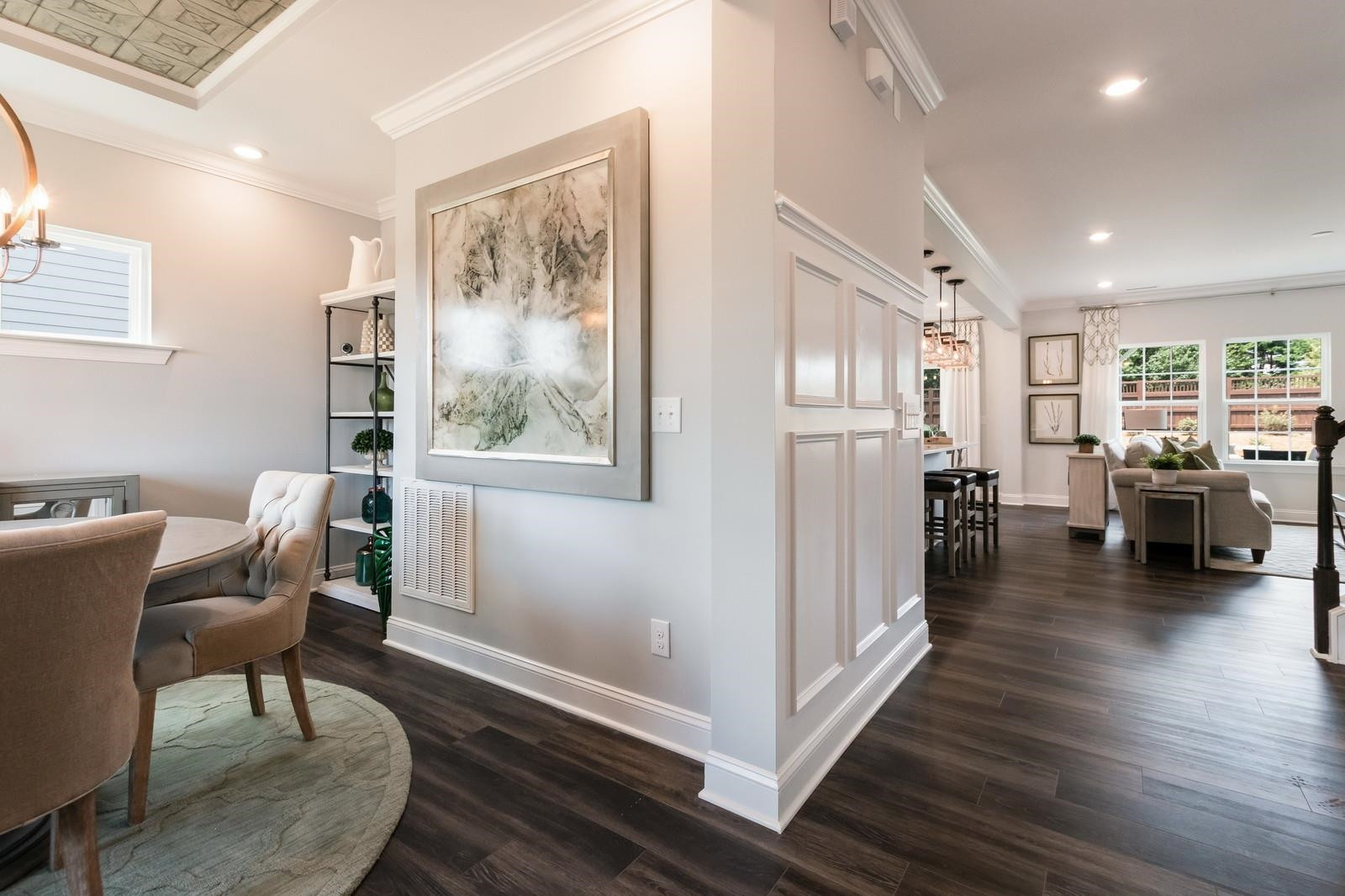 4121 Snowy Range Circle, Unit LANDRUM Raleigh, NC 27616 - Photo 7 of 27 a living room with furniture and a wooden floor