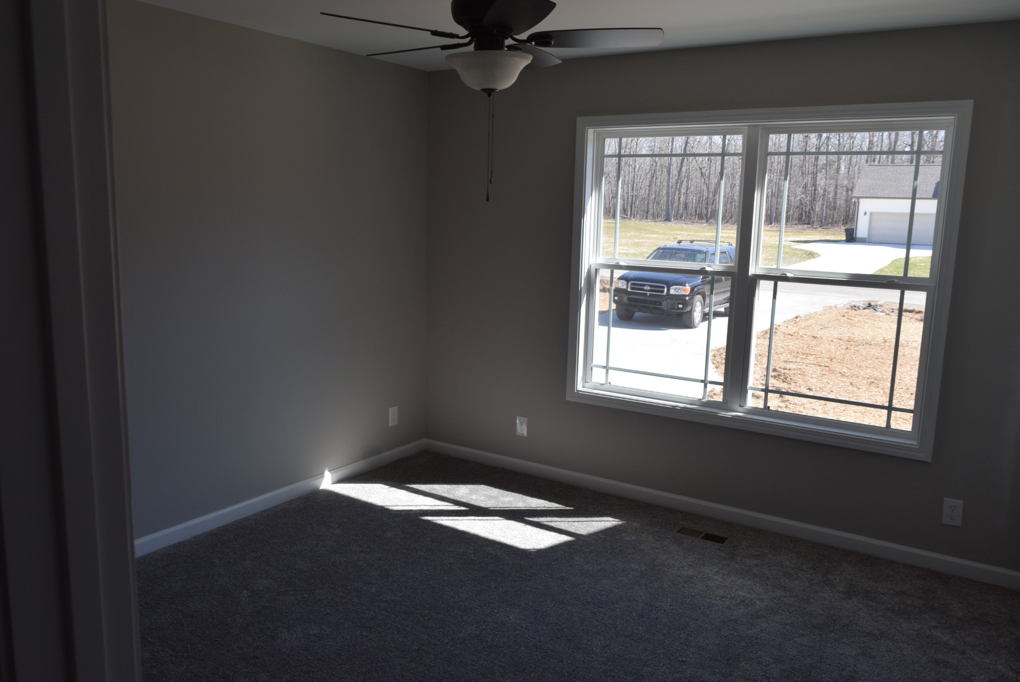 560 Ballard Road Manchester, TN 37355 - Photo 3 of 7 an empty room with a window