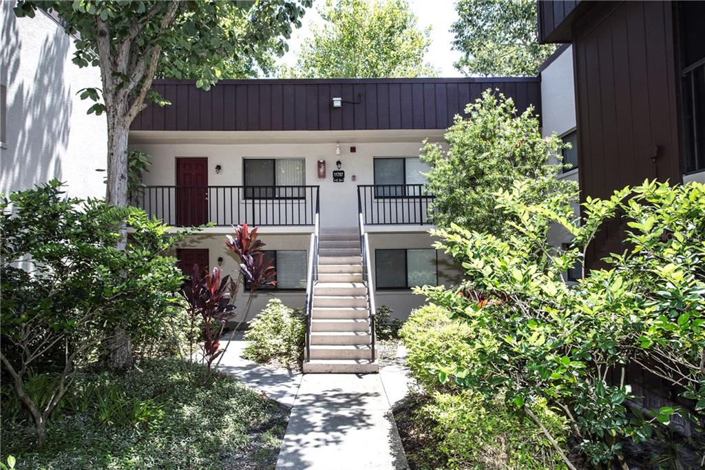 11707 Raintree Village Boulevard, Unit A Temple Terrace, FL 33617 - Photo 1 of 1 front view of a house with a yard