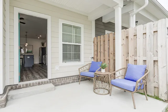 a front view of a house with a porch