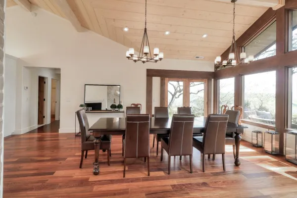 a view of a brick house with a large windows