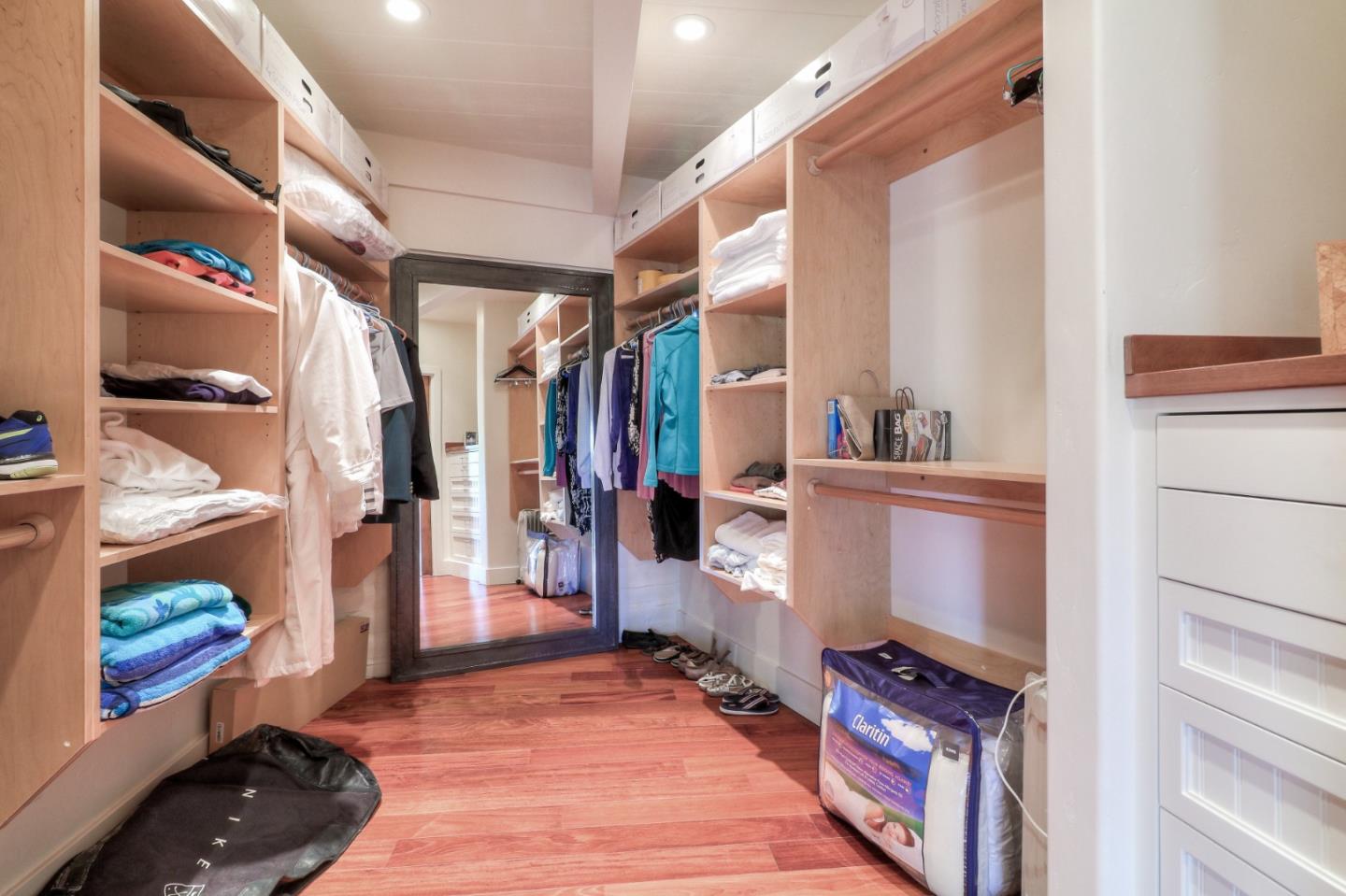 500 El Caminito Road Carmel Valley, CA 93924 - Photo 34 of 105 a view of walk in closet with clothes and shoes