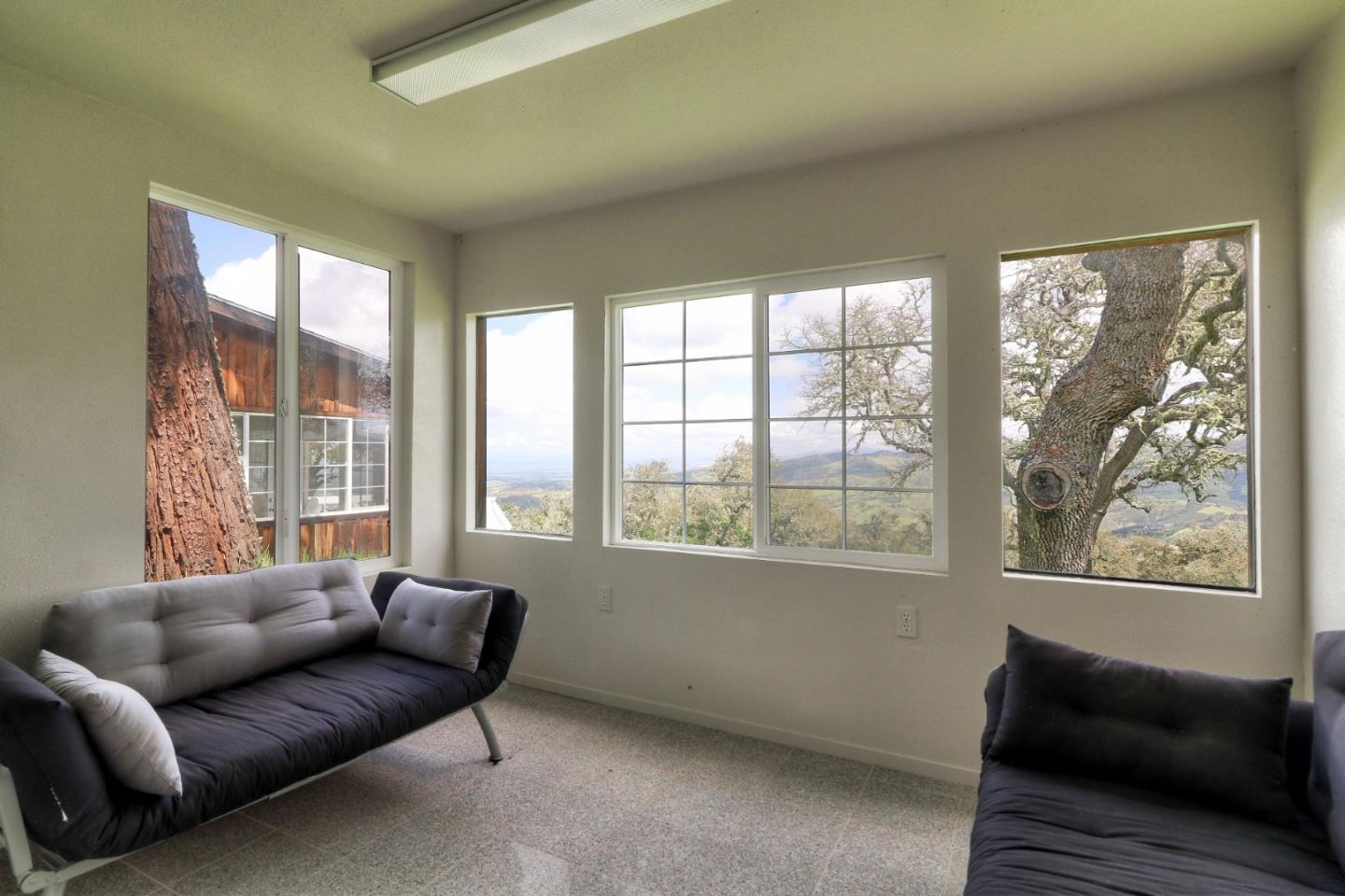 500 El Caminito Road Carmel Valley, CA 93924 - Photo 60 of 105 a living room with furniture and a window