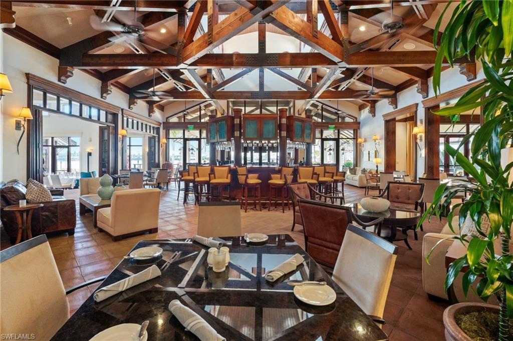 19086 Via Messina Way Miromar Lakes, FL 33913 - Photo 34 of 46 a living room with furniture and wooden floor