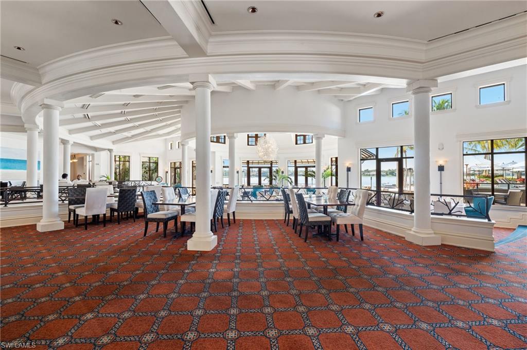 19086 Via Messina Way Miromar Lakes, FL 33913 - Photo 37 of 46 a living room with patio furniture and a dining table