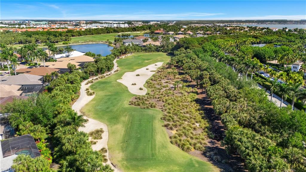 19086 Via Messina Way Miromar Lakes, FL 33913 - Photo 42 of 46 an aerial view of a houses with a yard