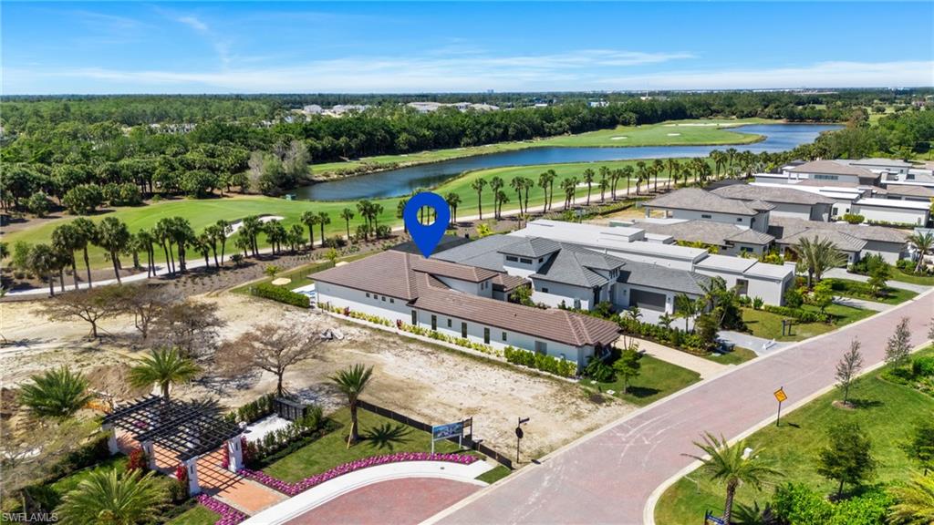 19086 Via Messina Way Miromar Lakes, FL 33913 - Photo 46 of 46 an aerial view of a house with a garden
