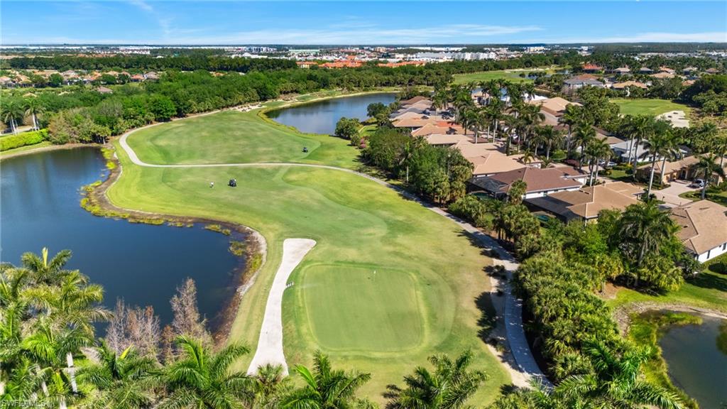19086 Via Messina Way Miromar Lakes, FL 33913 - Photo 47 of 50 an aerial view of residential houses with outdoor space and swimming pool