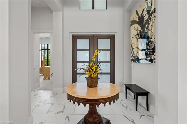 a room with a table and chairs