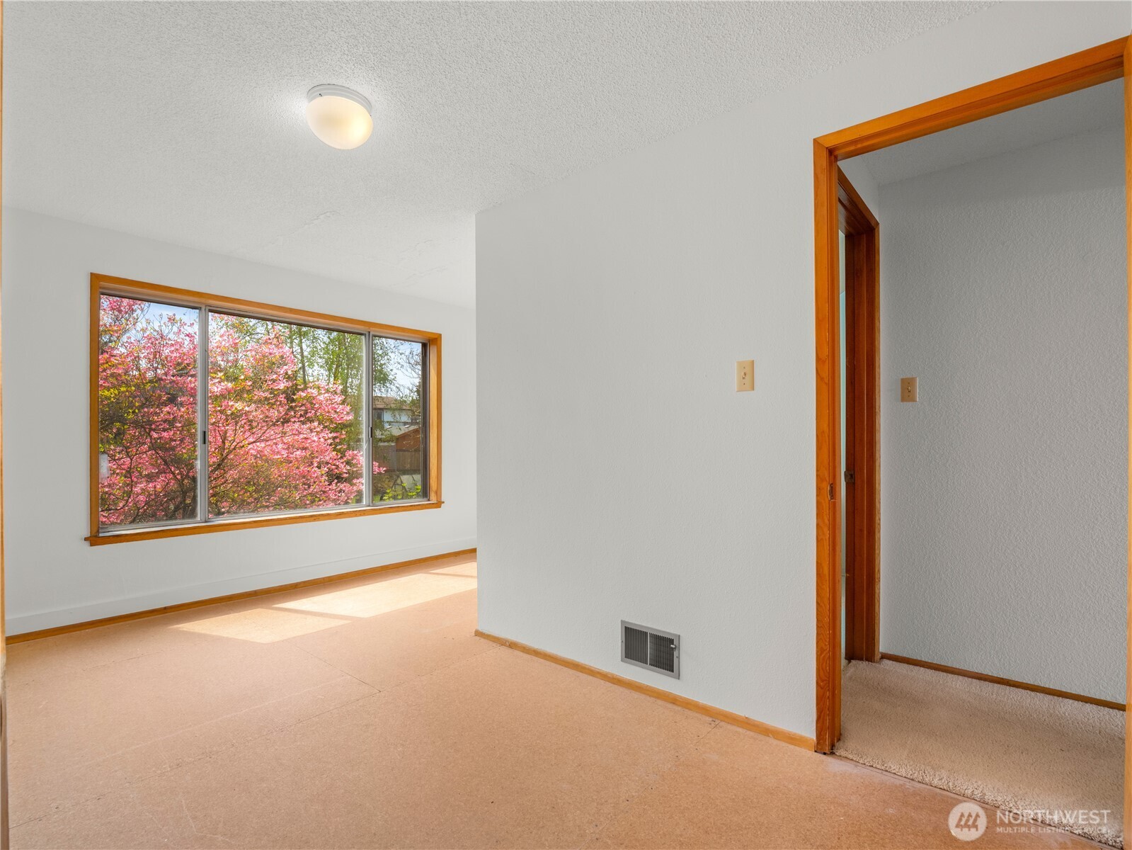 5704 North Ruby Street Tacoma, WA 98407 - Photo 23 of 38 an empty room with a large window