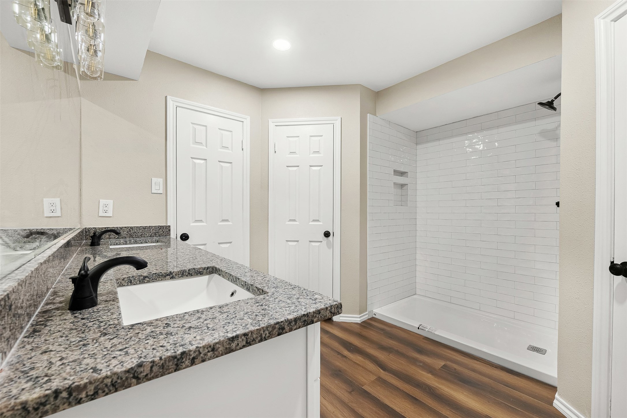4238 Annawood Circle Spring, TX 77388 - Photo 22 of 46 a bathroom with a granite countertop sink and a mirror