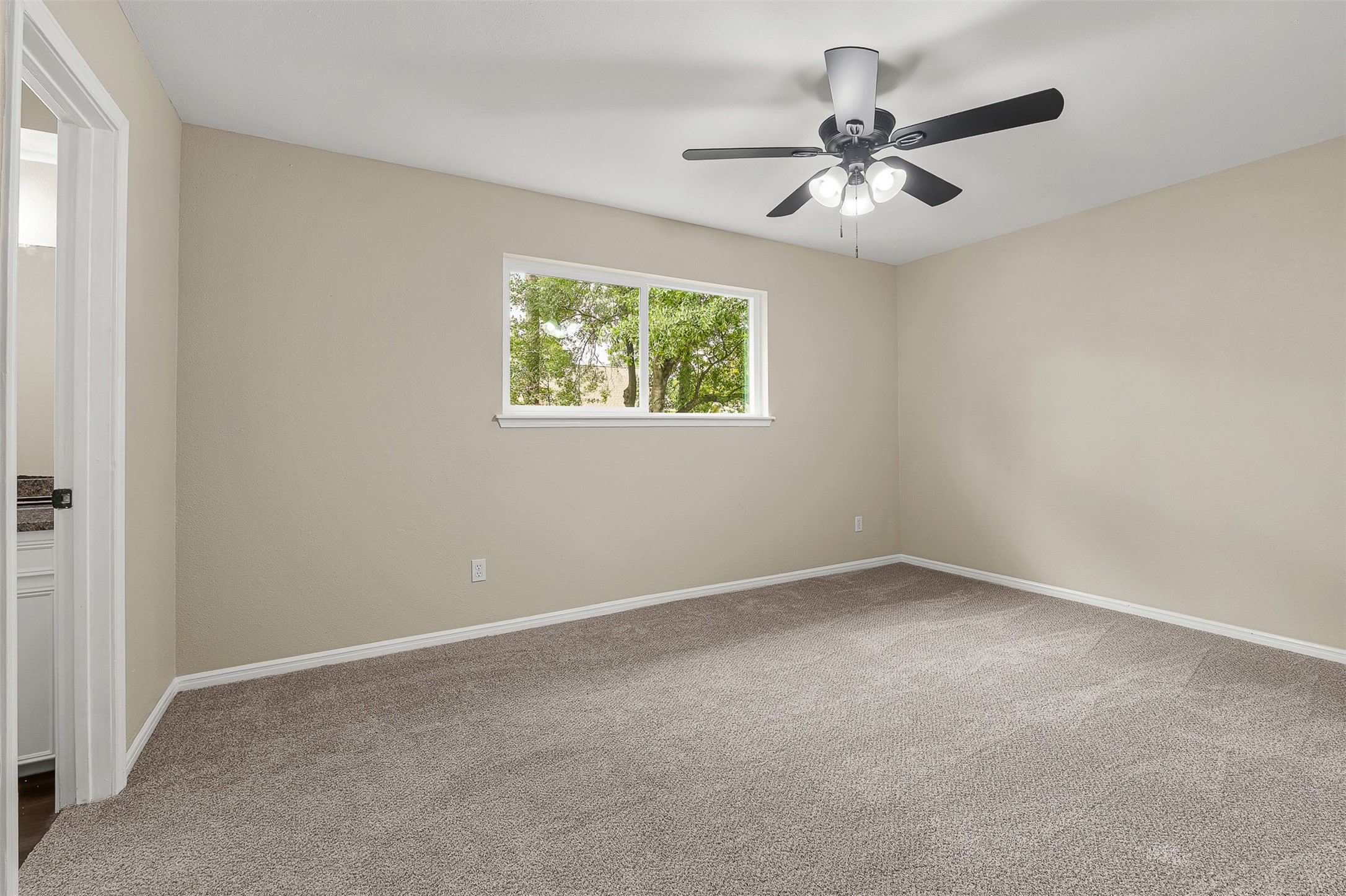 4238 Annawood Circle Spring, TX 77388 - Photo 26 of 46 an empty room with a window and a fan