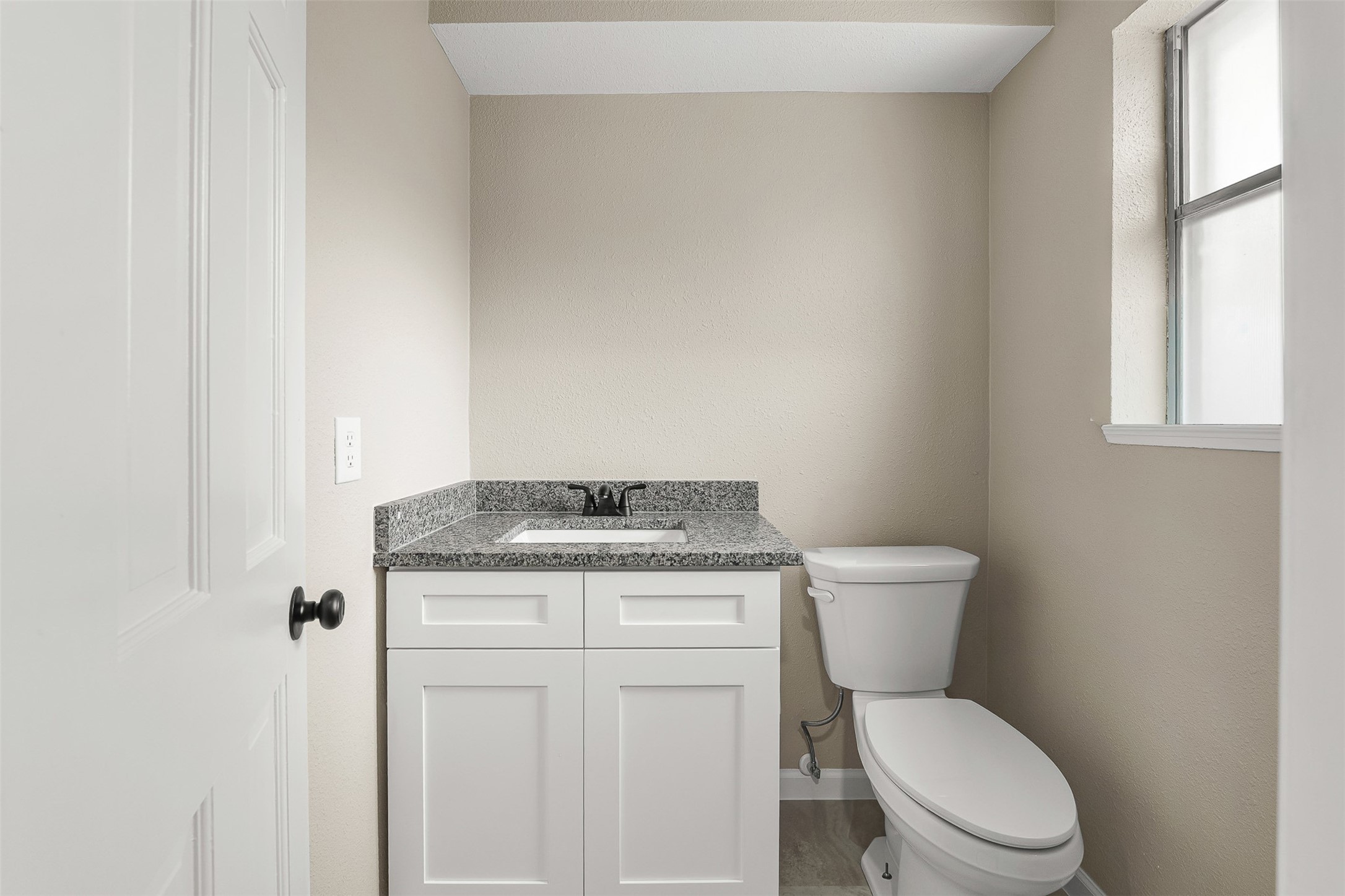 4238 Annawood Circle Spring, TX 77388 - Photo 33 of 46 a white toilet sitting next to a bathroom sink