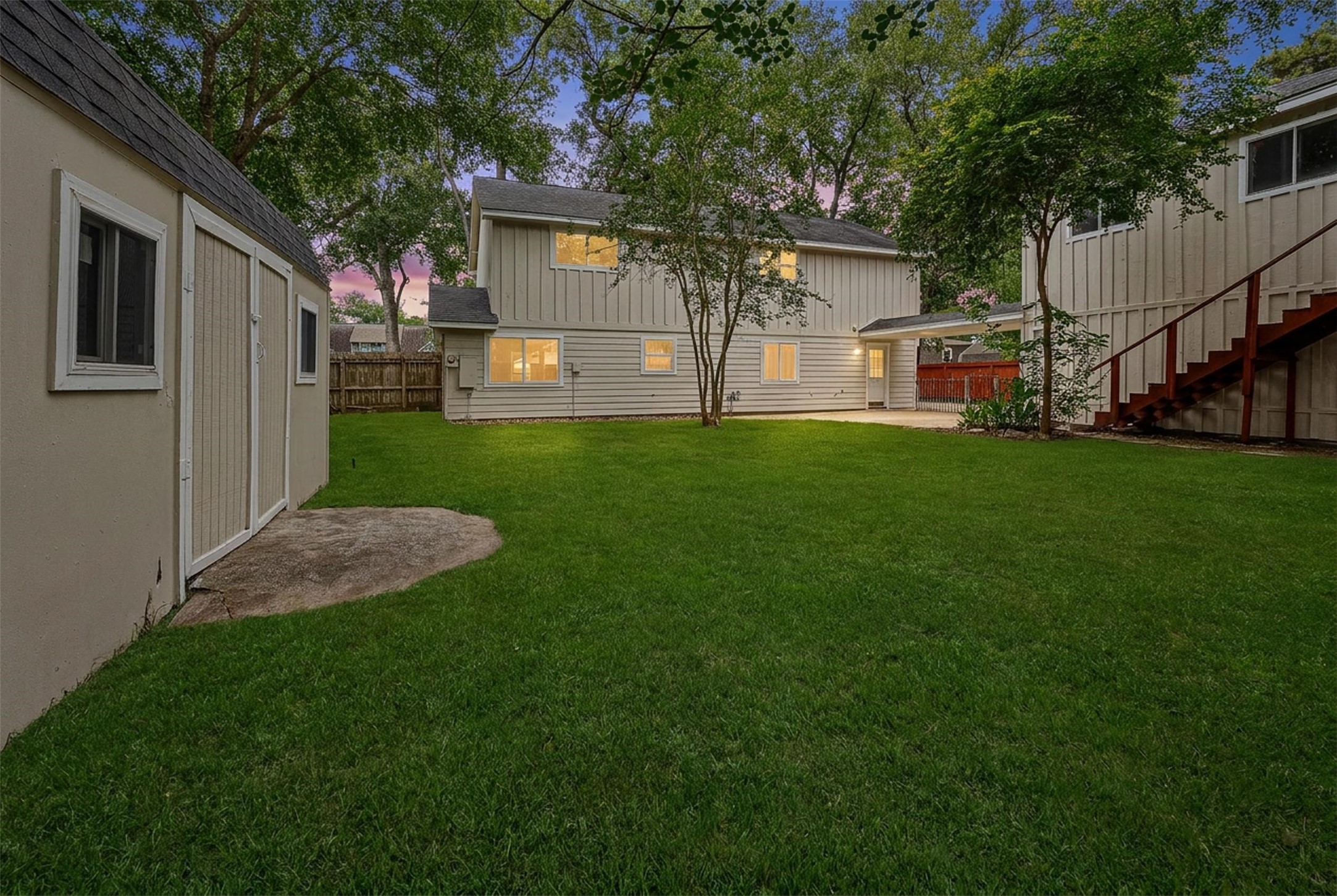 4238 Annawood Circle Spring, TX 77388 - Photo 39 of 46 a view of a backyard with a house and a large tree