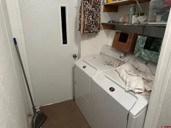 a bathroom with a toilet and a sink