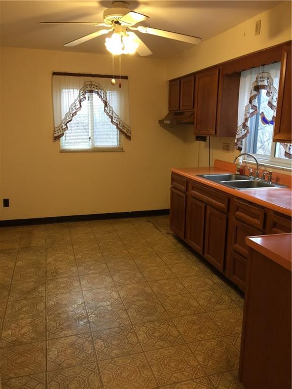 443 Bechman Street Springdale, PA 15144 - Photo 11 of 19 Spacious Eat-In Kitchen, 15x10 with lots of cabinets!