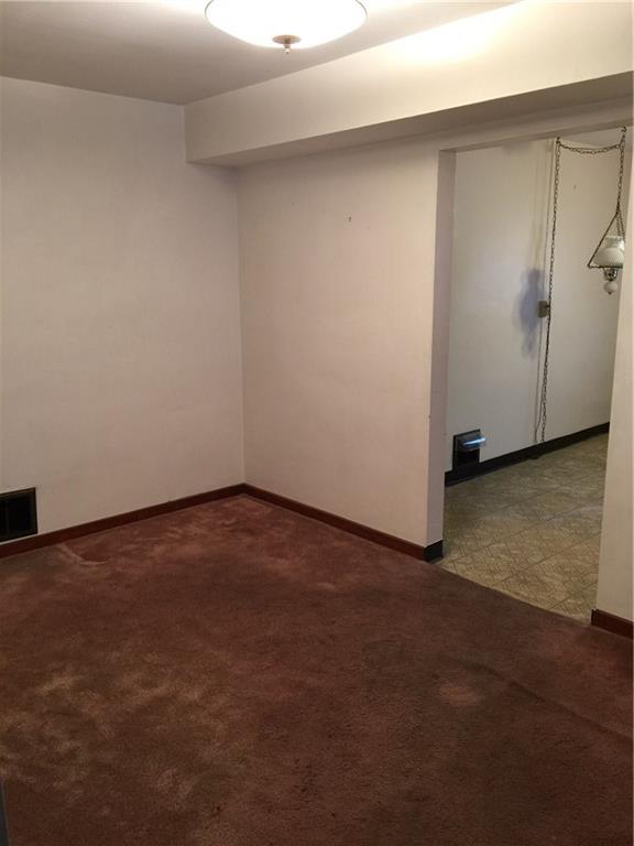 443 Bechman Street Springdale, PA 15144 - Photo 12 of 19 Dining Room 13x9. Wall could be opened to allow for a wonderful open floor plan into the Kitchen!