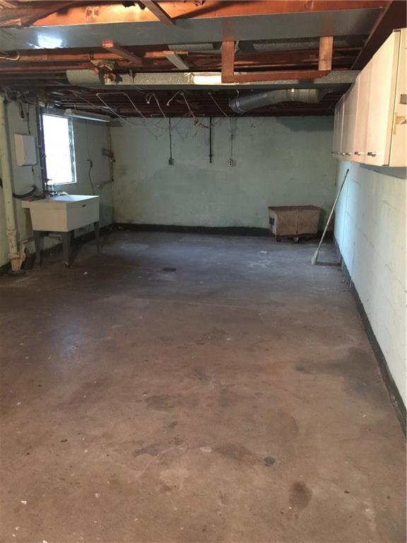 443 Bechman Street Springdale, PA 15144 - Photo 15 of 19 Huge 14x28 Laundry/Workshop Area with Access to Rear Yard!