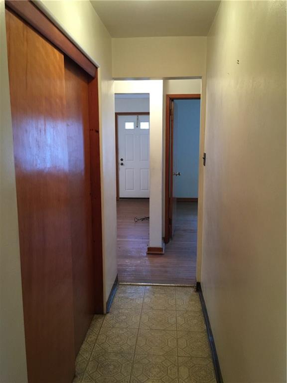 443 Bechman Street Springdale, PA 15144 - Photo 9 of 19 Hallway from front bedrooms and living room leads to Master Bedroom in rear of home! One of many storage closets throughout the home!
